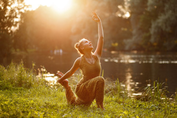 Woman Yoga exercises outdoor
