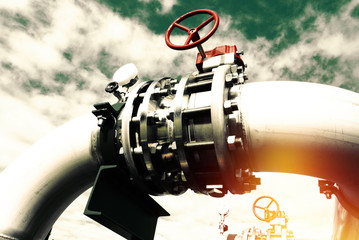 Industrial zone, Steel pipelines and valves against blue sky