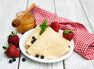 crepes with strawberries and blueberries
