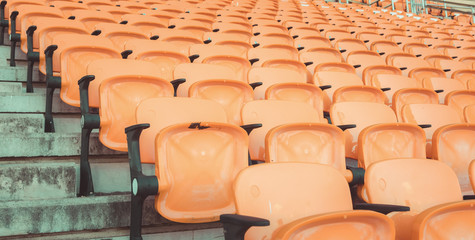 Empty seats at soccer stadium , vintage