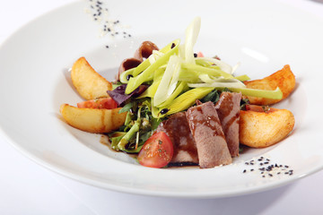 Salad with tongue and potatoes