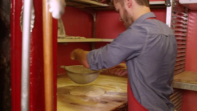 Chefs at restaurant making pizza - 4K