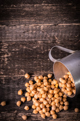 chickpeas on rustic background, healthy food concept