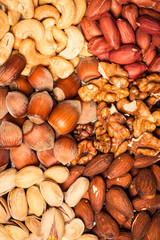 Mix nuts on wooden table,healthy vegan food.