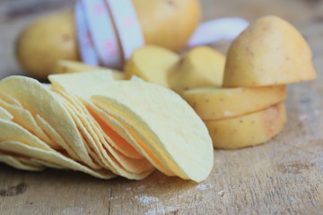 Fresh potatoes with potatoes chips