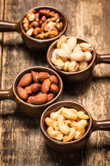 Mix nuts on wooden table,healthy vegan food.