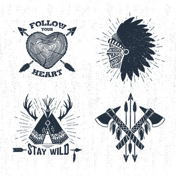 Hand drawn tribal labels set with tree trunk, tomahawks, and teepee vector illustrations and inspirational lettering.