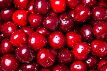 Fresh cherry on wooden table healthy food