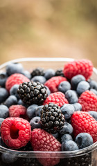 Fresh summer berries , wooden background, healthy food.