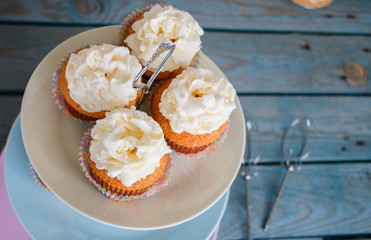 Cupcakes on colorful three-storey plate