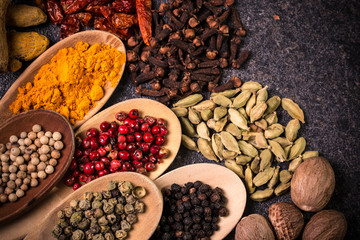 spices and herbs on wooden table , medicinal concept