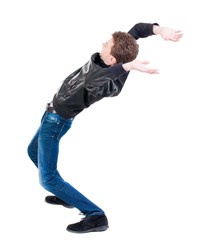 Balancing young man or dodge falling man. Rear view people collection.  backside view of person.  Isolated over white background. Man blows the wind.