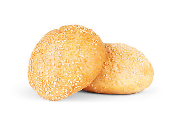 Round sandwich bun with sesame seeds isolated on white backgroun