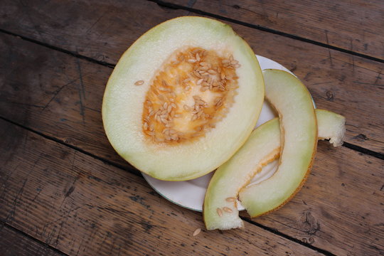 Cut melon on plate