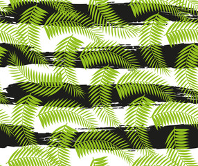 Beautiful seamless tropical jungle floral pattern background with palm leaves. Vector illustration.