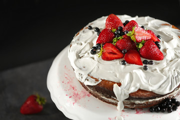 Tasty delicious cake decorated with berries