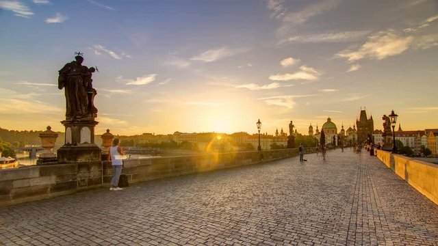 Charles Bridge in Prague during the sunrise timelapse, Bohemia, Czech Republic.