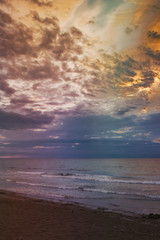 Sunrise on the beach and clouds