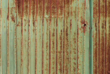 Rusty green metal wall background
