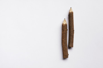 Wooden pencil with space on wood background