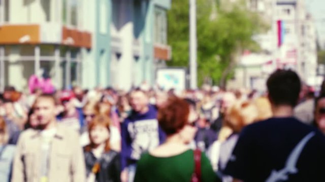 Blurred people walking in a crowded street. 1920x1080