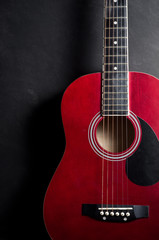 Obraz na płótnie Canvas Still life photography : Part of old acoustic guitar on dark background