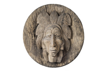 old wood carved of indian chief head isolated on white