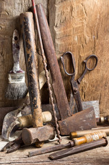 Still life photography : various working tools on old wood background