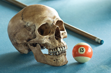 skull with number 13 pool game ball
