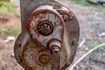 House lifting jack. Old rusty mechanical screw jack. Close-up