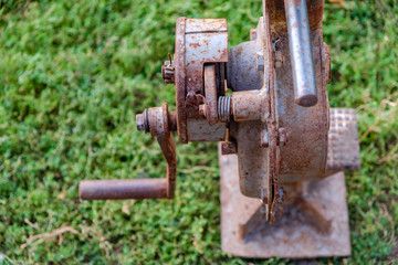 House lifting jack. Old rusty mechanical screw jack. Close-up