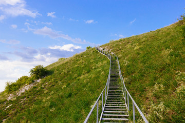 Fototapeta na wymiar Iron stairs in the mountain