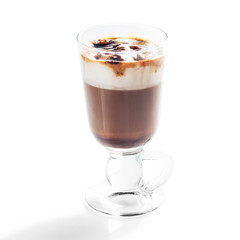 Irish coffee in glass isolated on white background