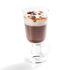 Irish coffee in glass isolated on white background