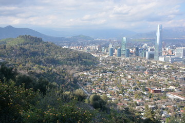 Obraz premium sunset and city lights in Santiago Chile