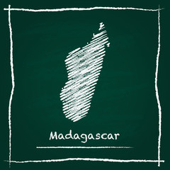 Madagascar outline vector map hand drawn with chalk on a green blackboard. Chalkboard scribble in childish style. White chalk texture on green background.
