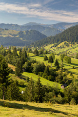 Obraz premium Beautiful summer landscape of the romanian village, in Bucovina