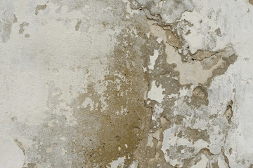 Wall fragment with scratches and cracks