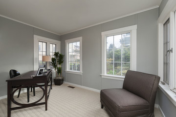Classic Office Space with Dark Wooden Furniture and Grey Walls