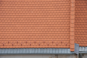 Closeuf of roof orange shingles