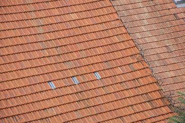 Closeup of new roof orange shingles