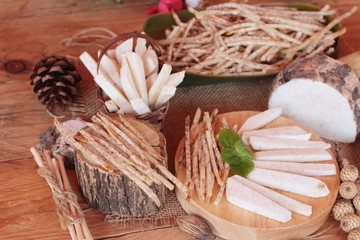 Fresh taro and taro stick with salt.