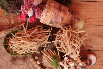 Fresh taro and taro stick with salt.