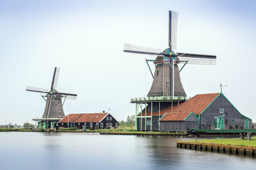 Fototapeta na wymiar Old, wooden windmills in The Netherlands