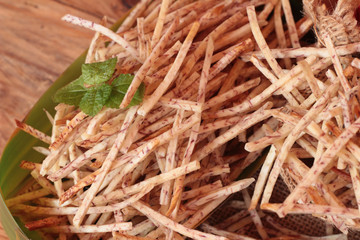 Fresh taro and taro stick with salt.