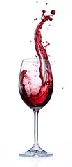 Fototapete Wein Rotwein, der in Gläsern spritzt