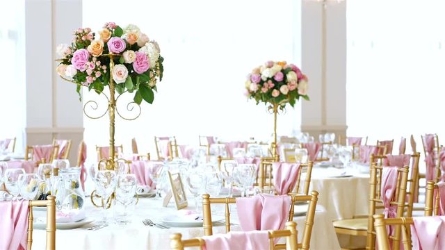 Wedding decorated tables with flowers