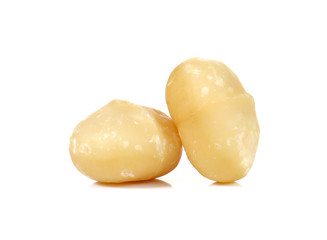 Macadamia on white background.Focus macadamia front.