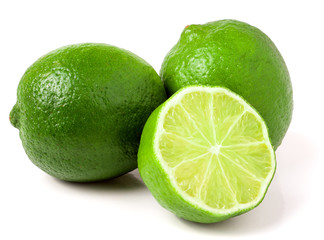 two limes with half isolated on white background