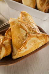 Brazilian snack. Meat Esfiha on the table